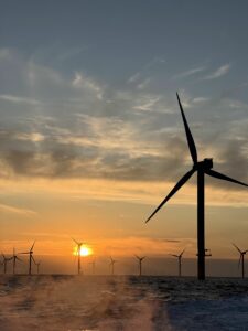 Offshore wind farm at sunset